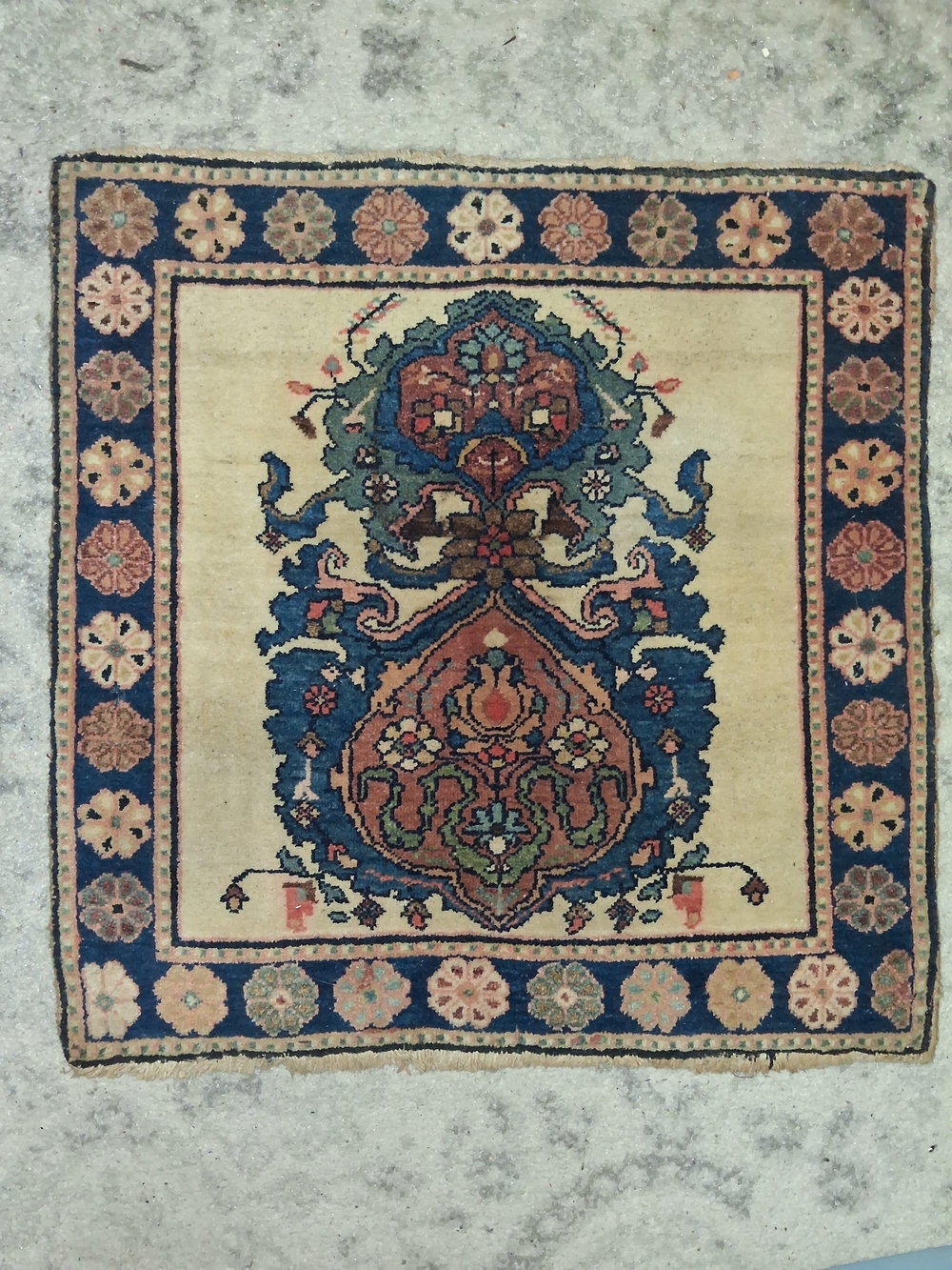 authentic, 80-year-old Turkish Yastik rug in this 22" x 22"